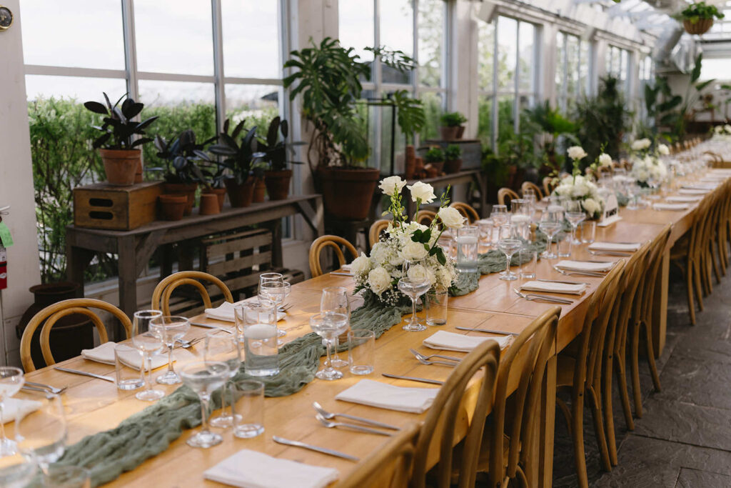 Table at wedding venue decorated with natural floral elements at Audrey's Farmhouse. 