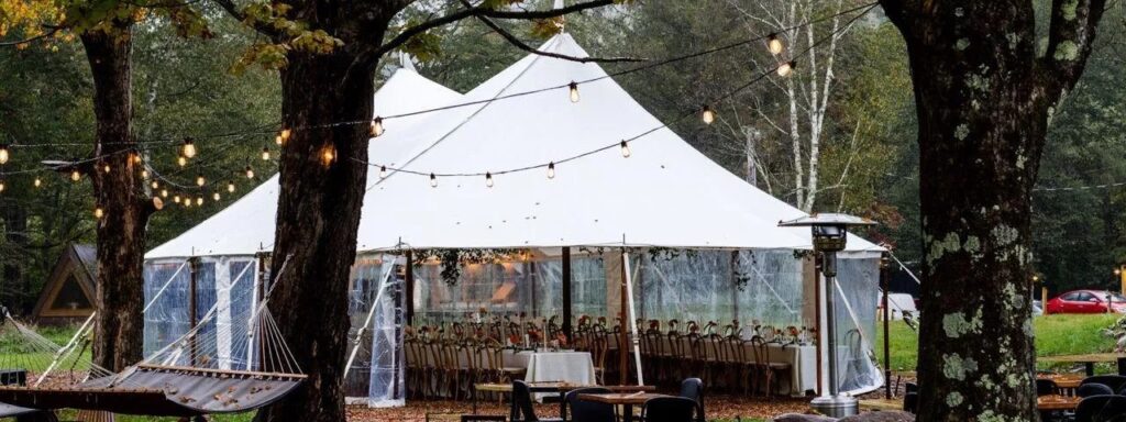 Photo of a tent hosting a wedding reception at the Eastwind Hotel Oliverea Valley | One of our favorite Catskills Wedding Venues