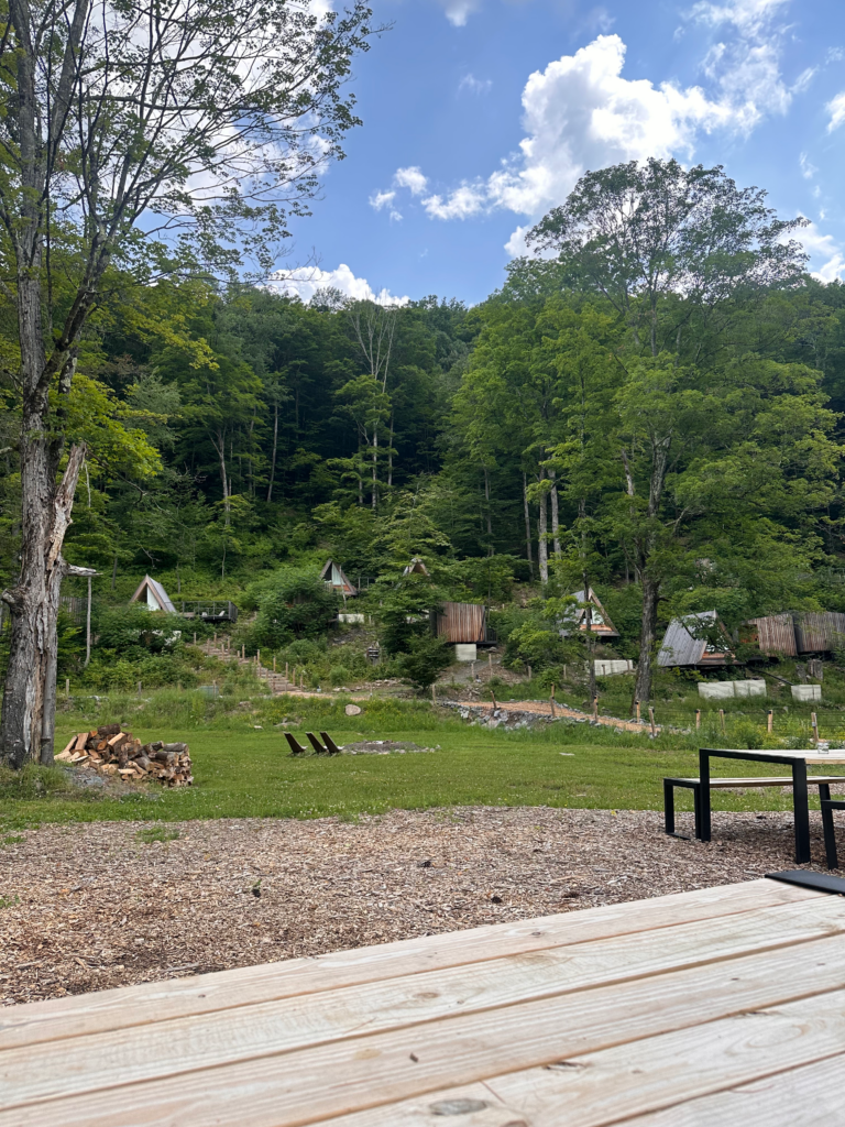 A view of the firepit and the A Frames at the Eastwind Hotels Oliverea Valley | One of our favorite Catskills Wedding Venues