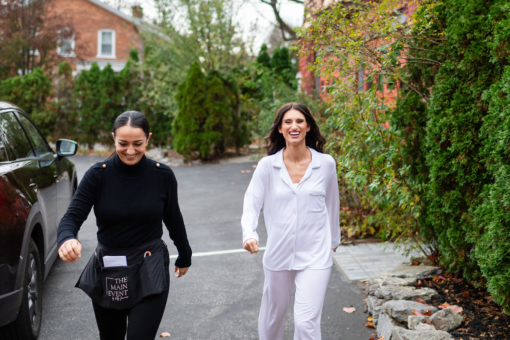 wedding planner of the main event by kelly escorting a bride at Union and Gables in Saratoga Springs new York