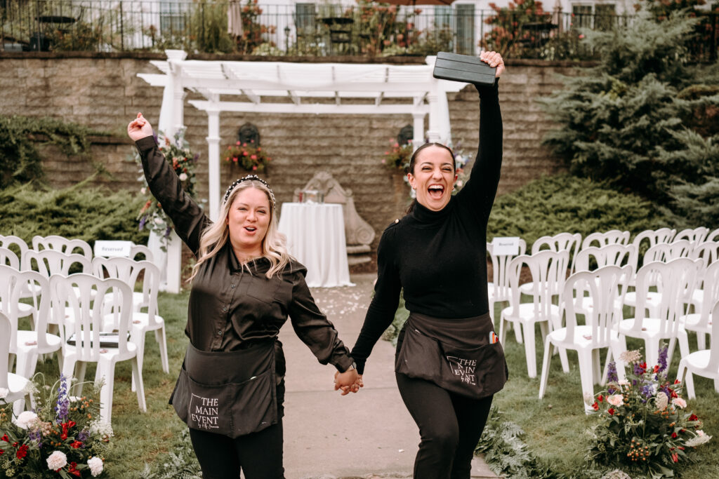 Wedding planners Kelly and Claire were skipping down the aisle at the Glen Sanders Mansion in Schenectady NY. On wedding days, wedding planners also know how to have fun