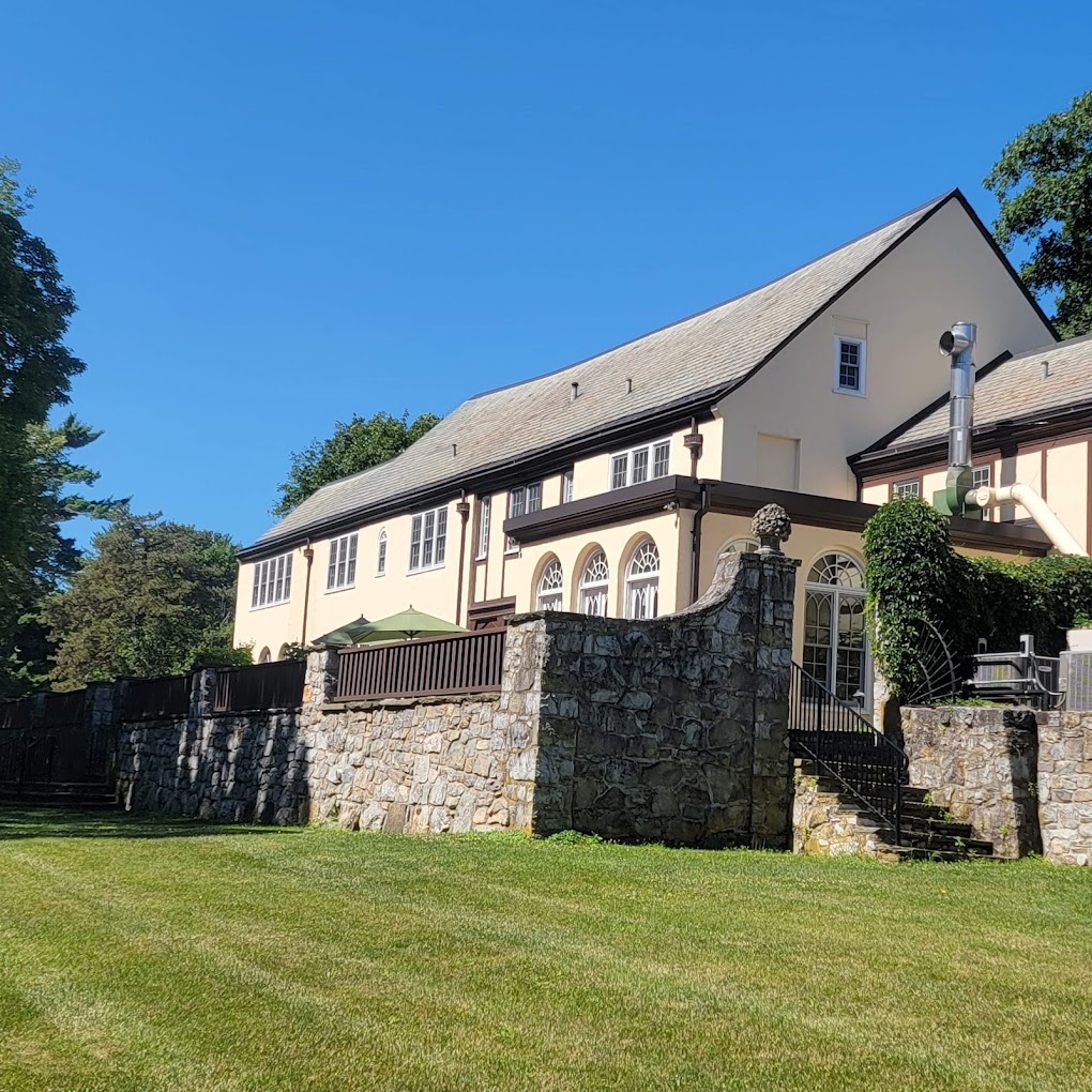 The Surrey Williamson Inn seen from the outside, with a grand staircase, perfect for a wedding first look