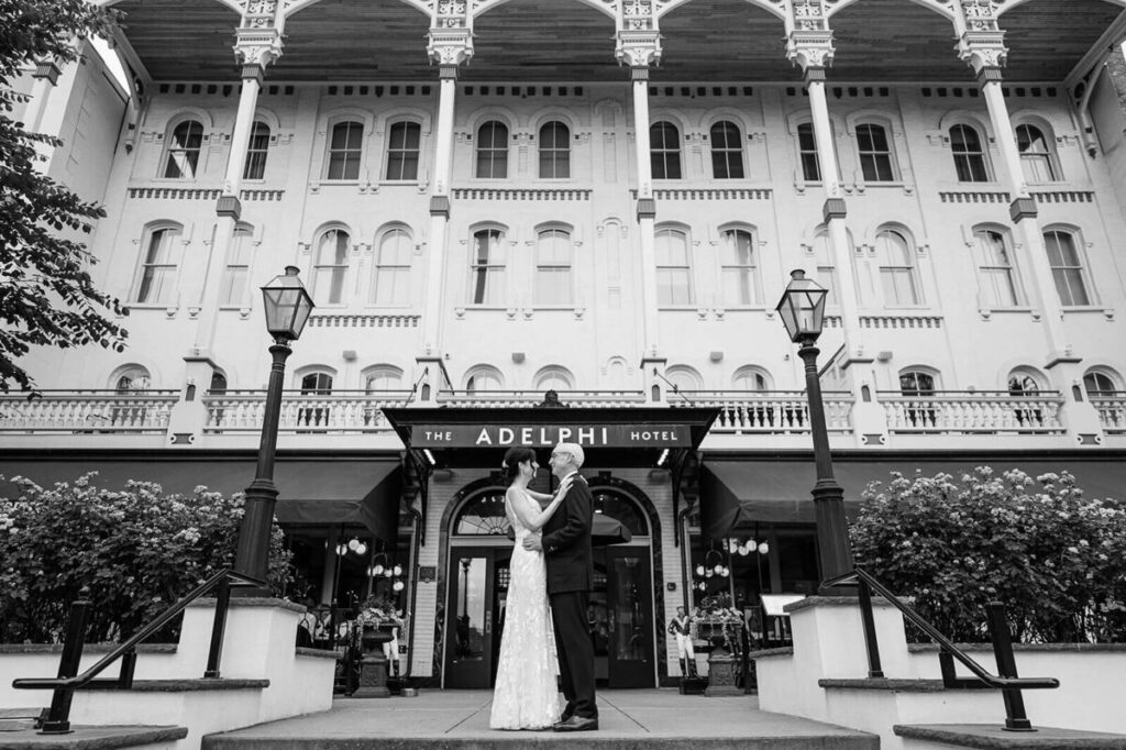 Bride and groom portrait in front of The Adelphi Hotel in Saratoga Springs, New York.
